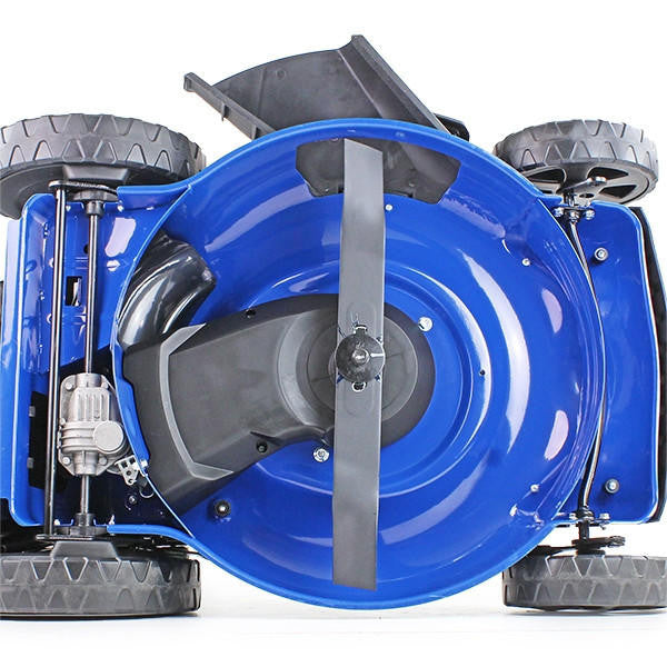 Underneath the mower, revealing the 20" blade