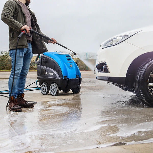 Clean mud and grime with a hot pressure washer