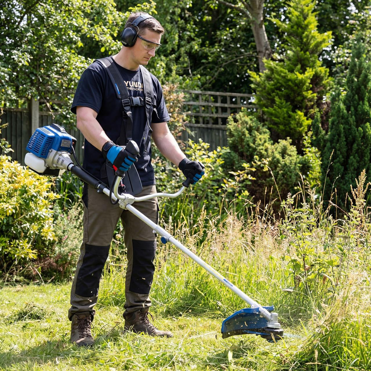 Hyundai petrol brushcutter blade cutting dense vegetation